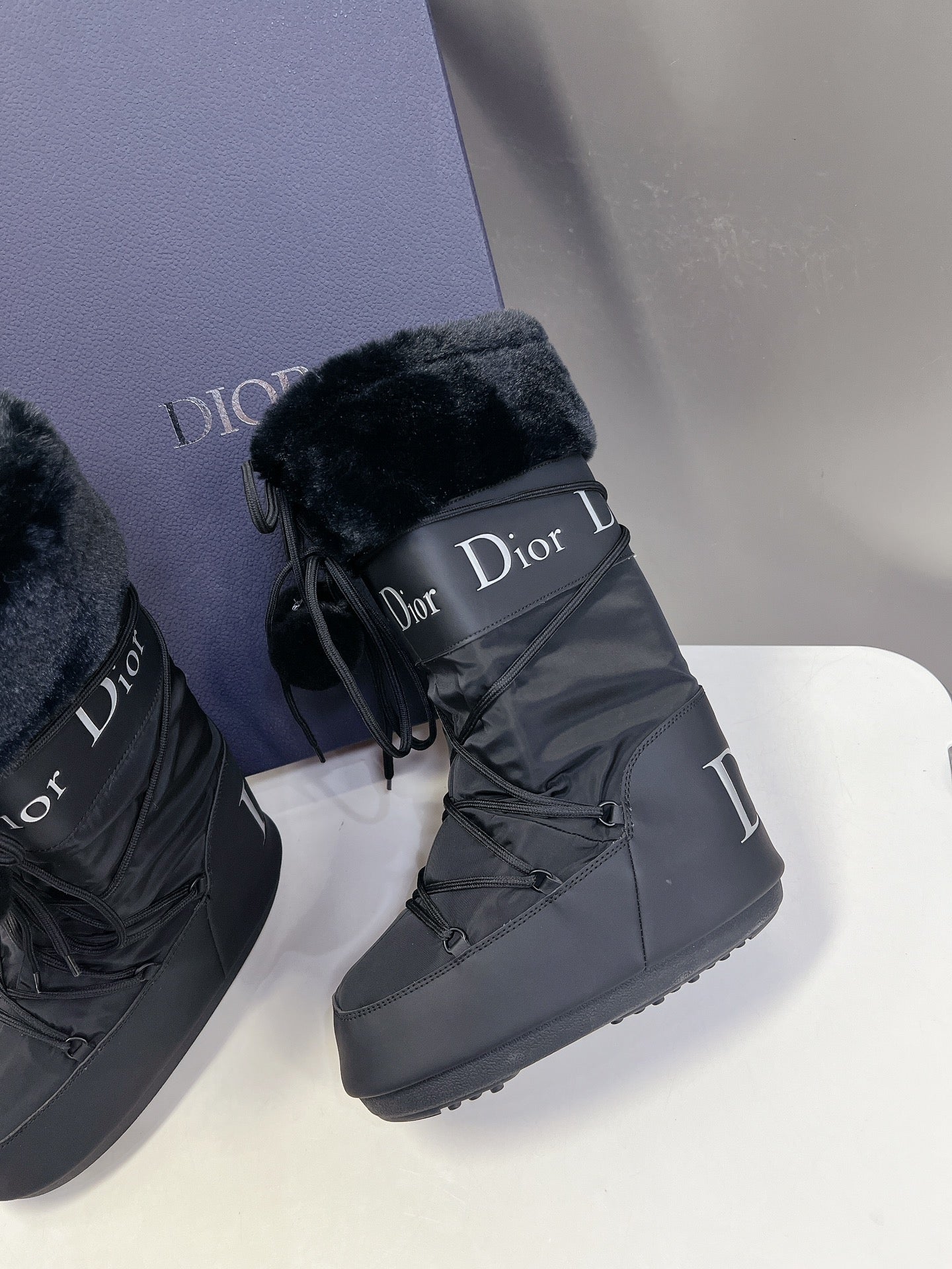DIOR Short Boots 60mm In Black Cowhide With Feather 989723