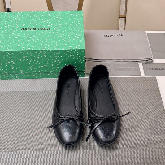 Balanciaga RHINESTONE BALLET FLATS WITH BOW IN BLACK WAX-OIL SHEEPSKIN
