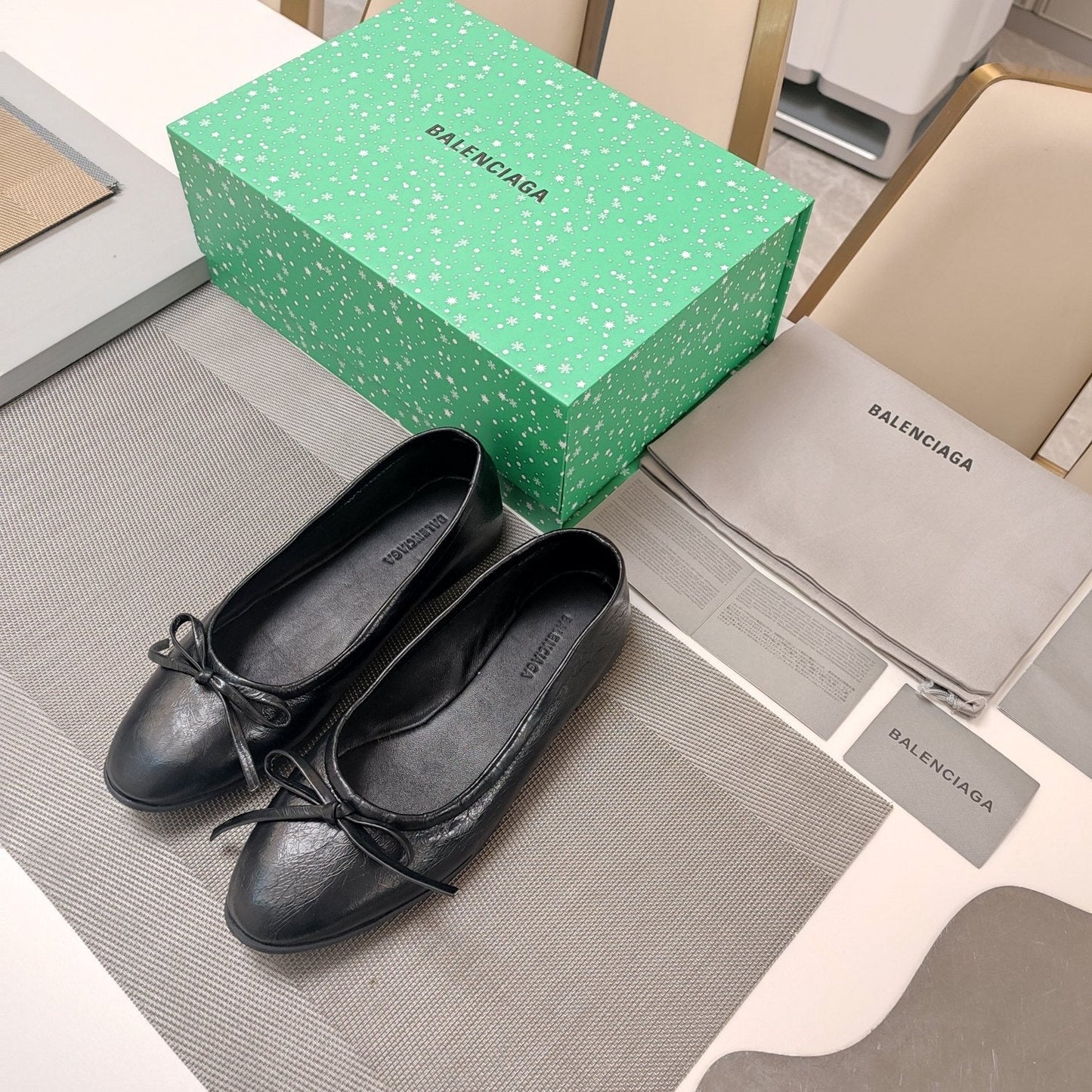 Balanciaga RHINESTONE BALLET FLATS WITH BOW IN BLACK WAX-OIL SHEEPSKIN