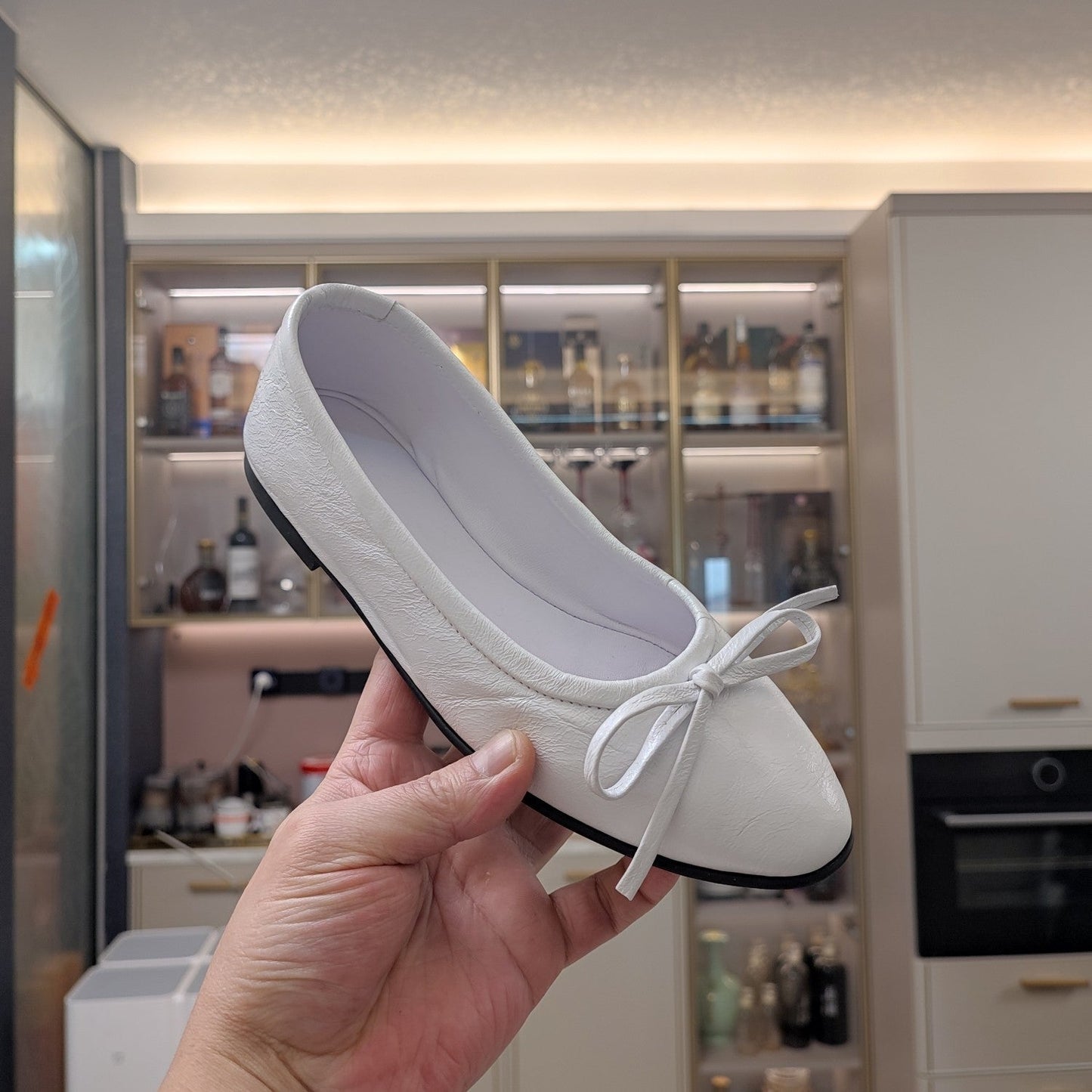 Balanciaga RHINESTONE BALLET FLATS WITH BOW IN WHITE WAX-OIL SHEEPSKIN