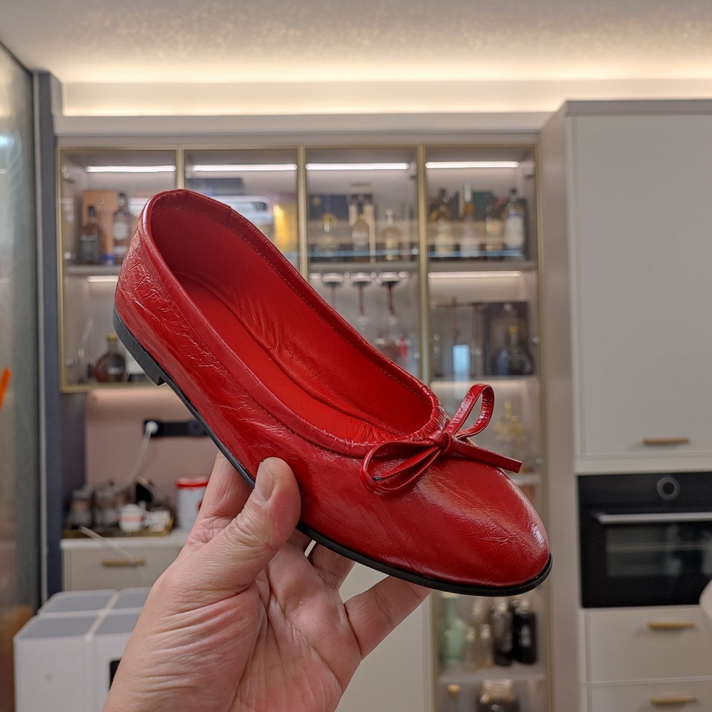 Balanciaga RHINESTONE BALLET FLATS WITH BOW IN RED WAX-OIL SHEEPSKIN